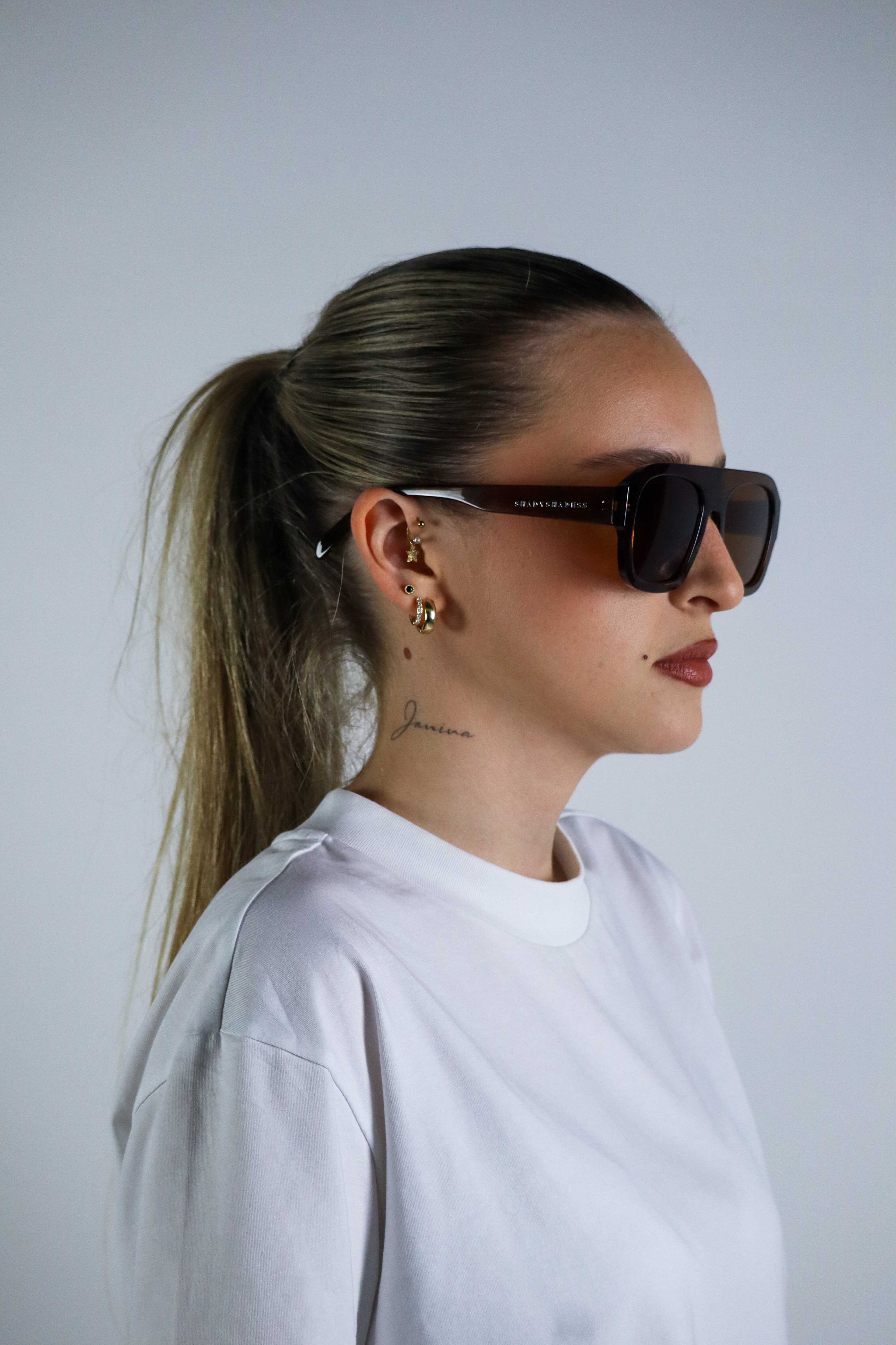 Amber Santos rectangular sunglasses with UV400 protective lenses