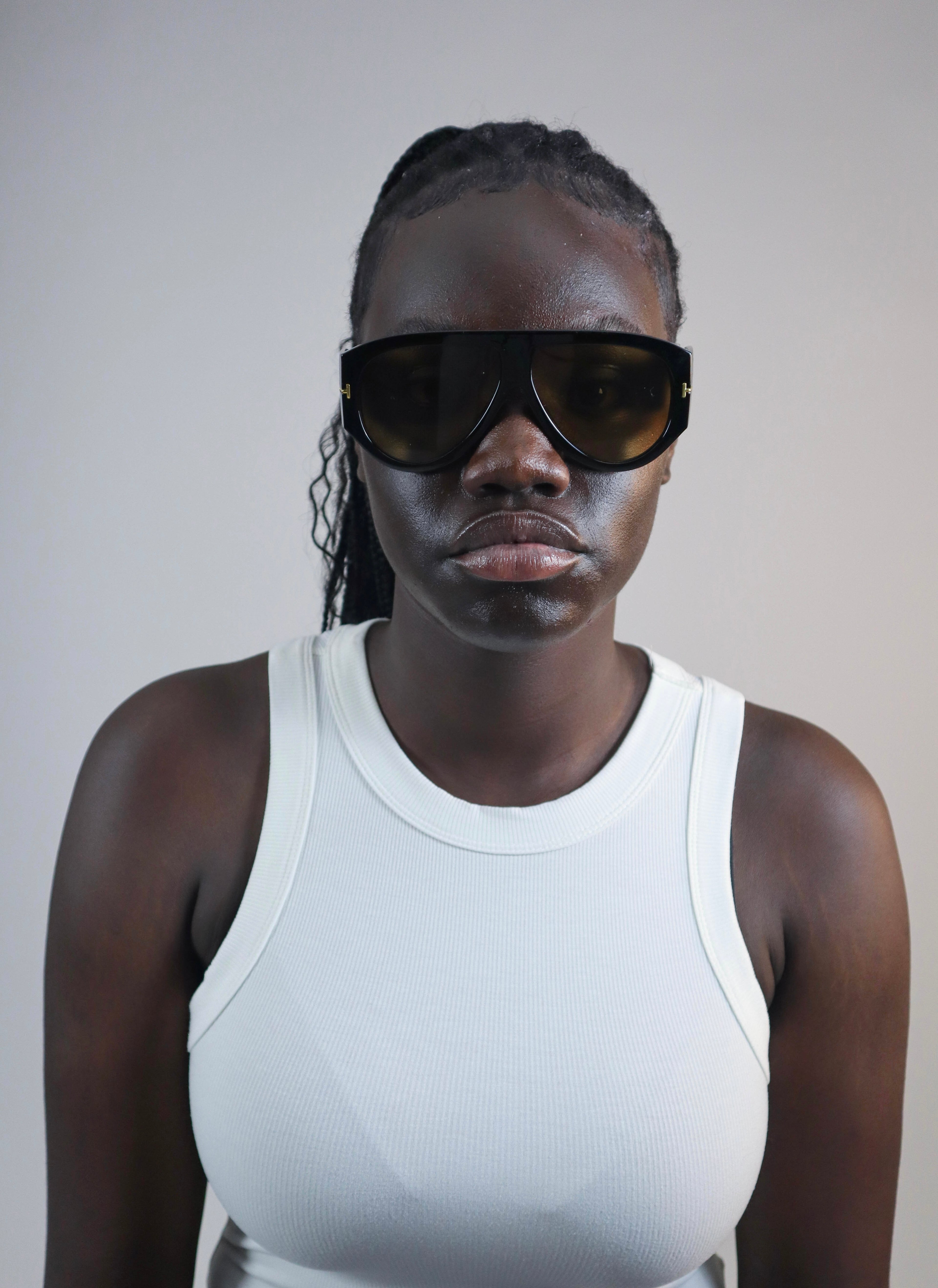 Coffee oval sunglasses with black acetate frame and polarised brown UV protection lenses